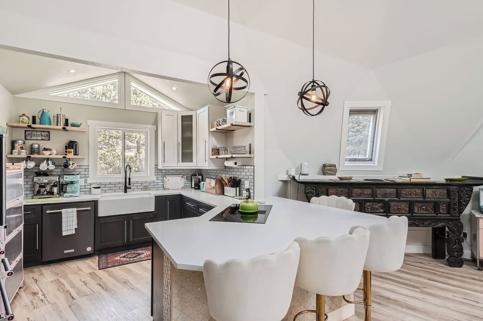 The showcase kitchen has a breakfast bar and a natural connection to the great room