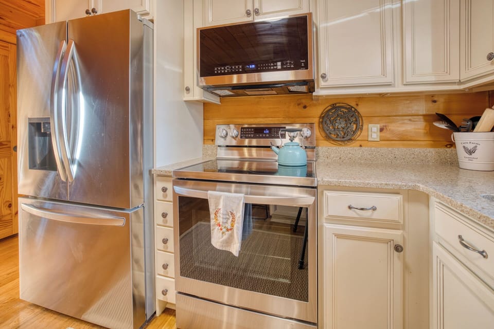 Spacious and Well Stocked Kitchen. 