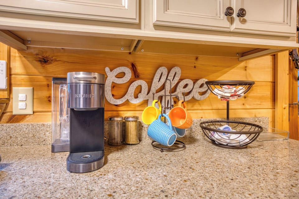 Single K-Cup and 12 Cup coffee maker available. Starter coffee, cream and sugar.