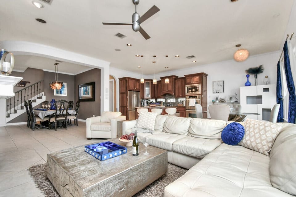 Relaxing on the Long Sofa by the Center Table.