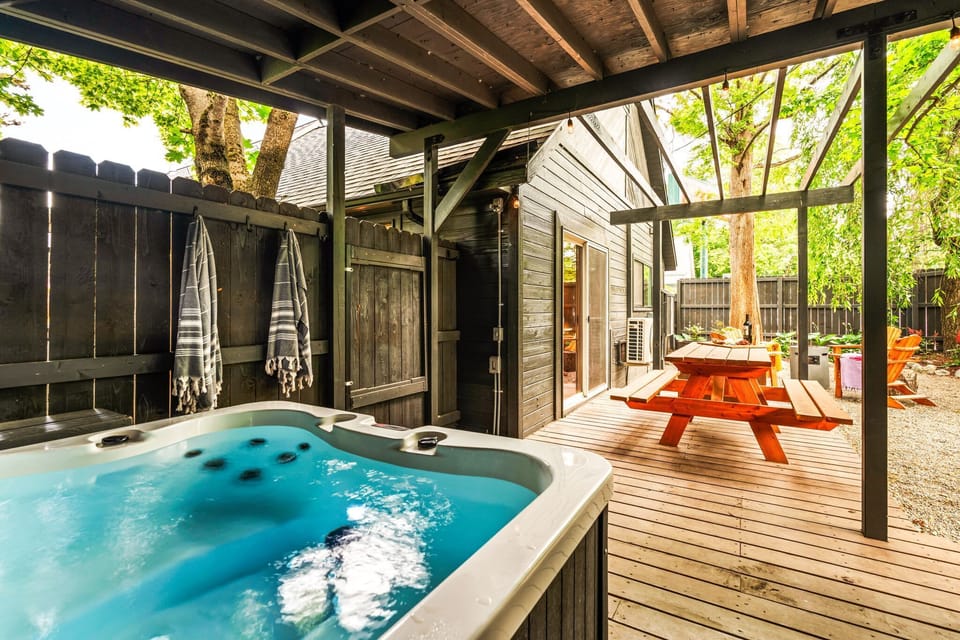 Soak in the covered Hot tub after a day of adventures