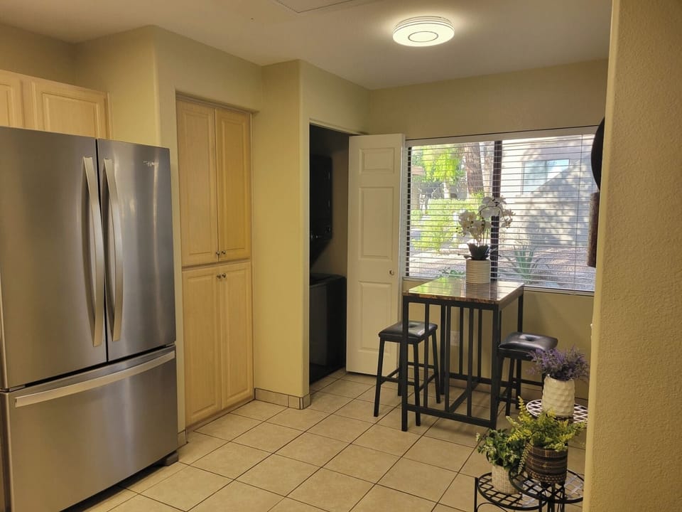 In-unit washer/dryer, large pantry, and seating area