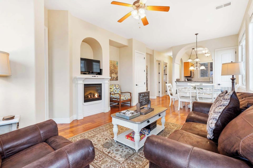 Open living space with Queen sofa sleeper, fire place, deck, and beautiful views