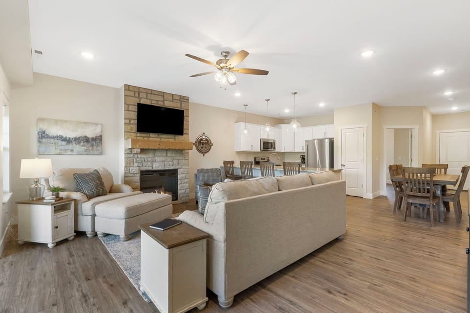 This home’s open, breezy Living Room offers space for the whole family to get comfortable