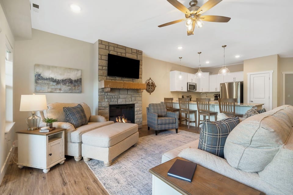This home’s open, breezy Living Room offers space for the whole family to get comfortable