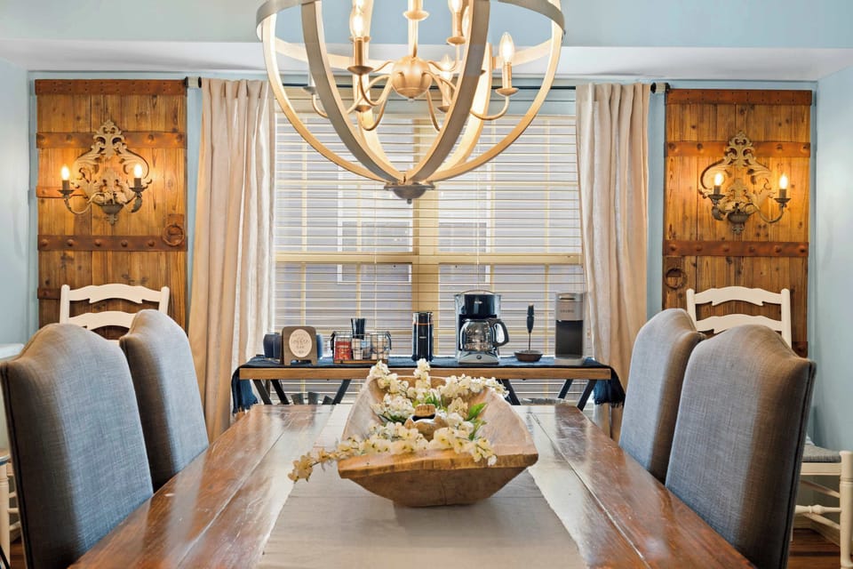 Gather for elegant meals together at the dining table, with seating for 4