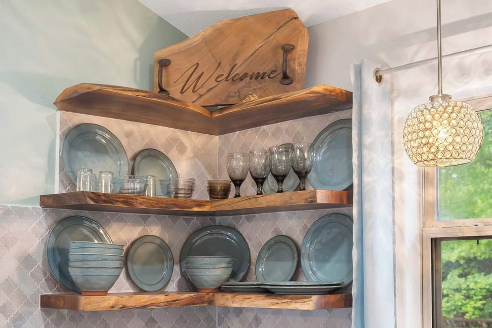 Enjoy tranquil finishes and all the comforts of home in the beautiful open Kitchen