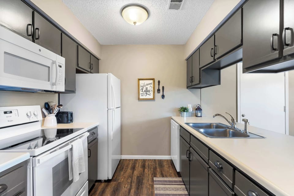 The open, airy kitchen offers ample space & all the comforts of home