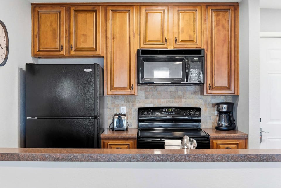 The spacious kitchen offers ample space & all the comforts of home