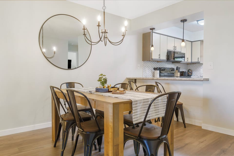 Enjoy a meal around the dining room table fit for 6