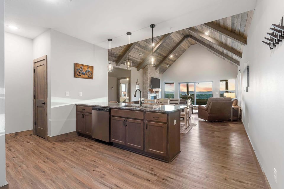 The sophisticated kitchen offers ample space & all the comforts of home