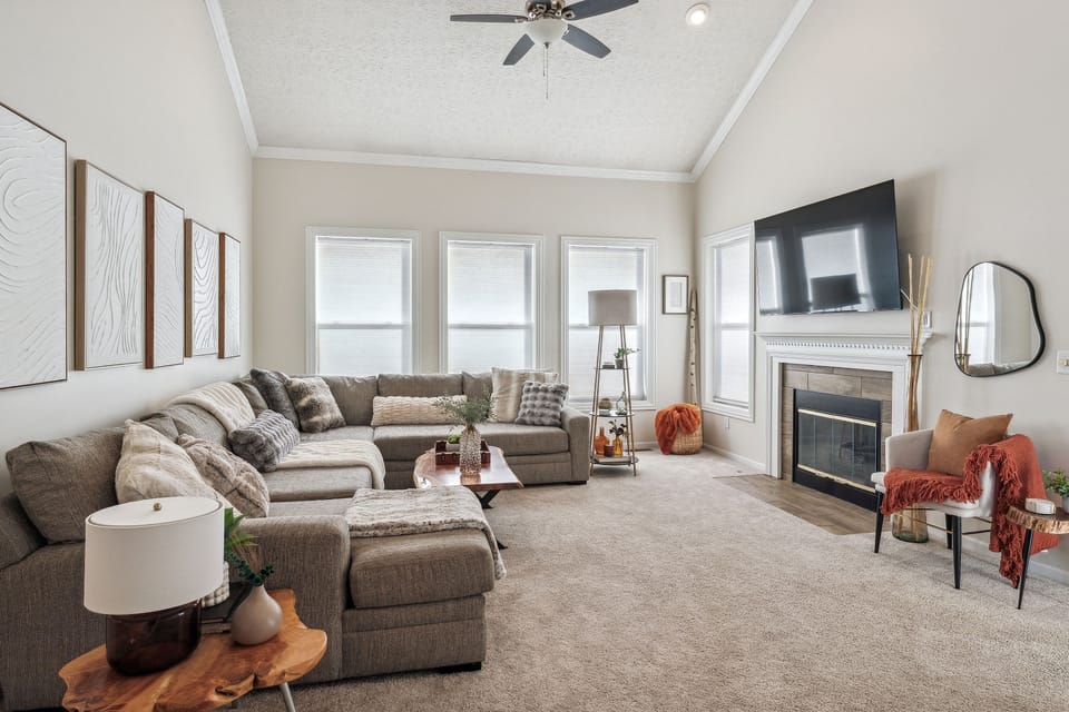 Living Room - Overview - 85 Inch SMART TV - 10 Seater Sectional - 2 Story Lofted