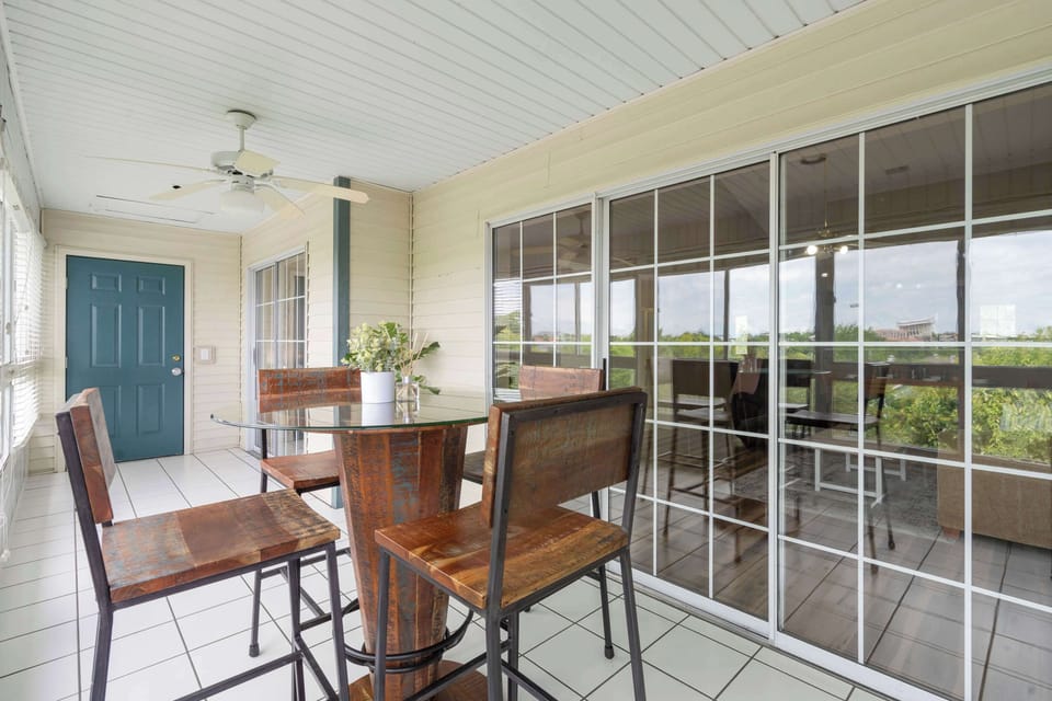 Dine al fresco on the patio table seating 4