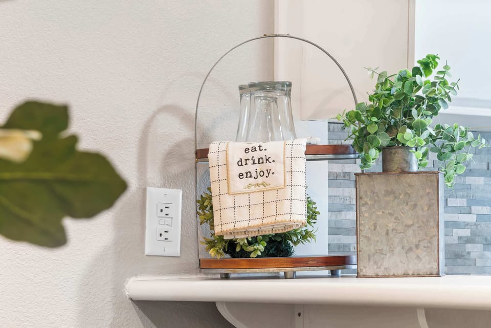The open, airy kitchen offers ample space & all the comforts of home