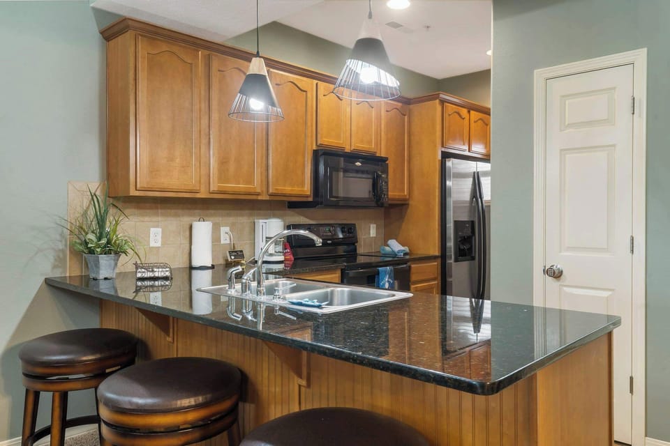 Kitchen bar counter with seating for 3