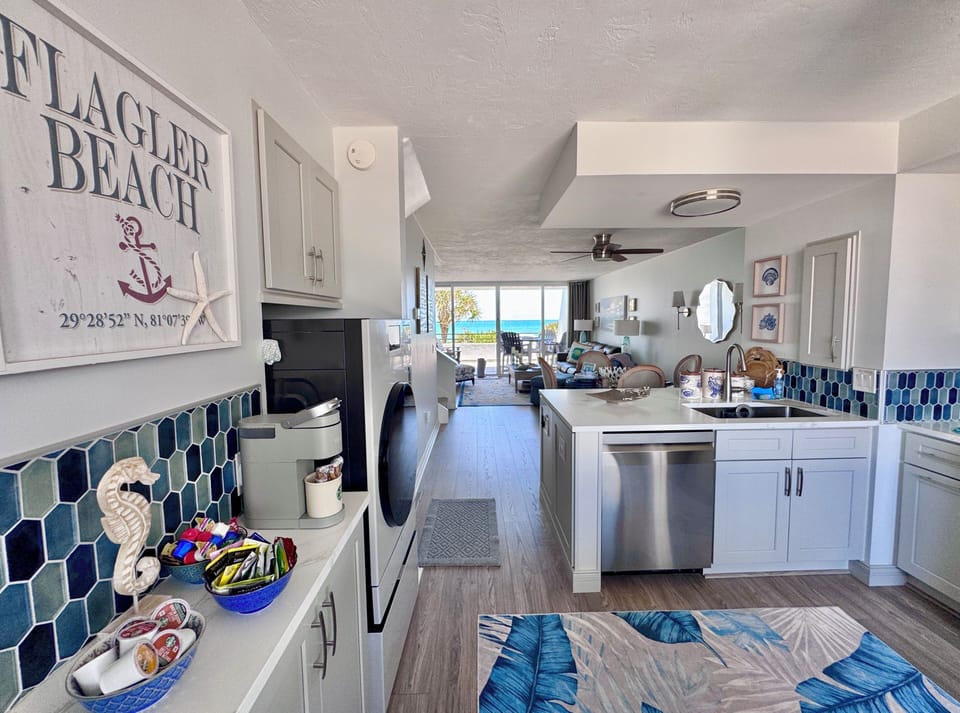 Integrated & open living. Kitchen conversation can be part of living room too. 