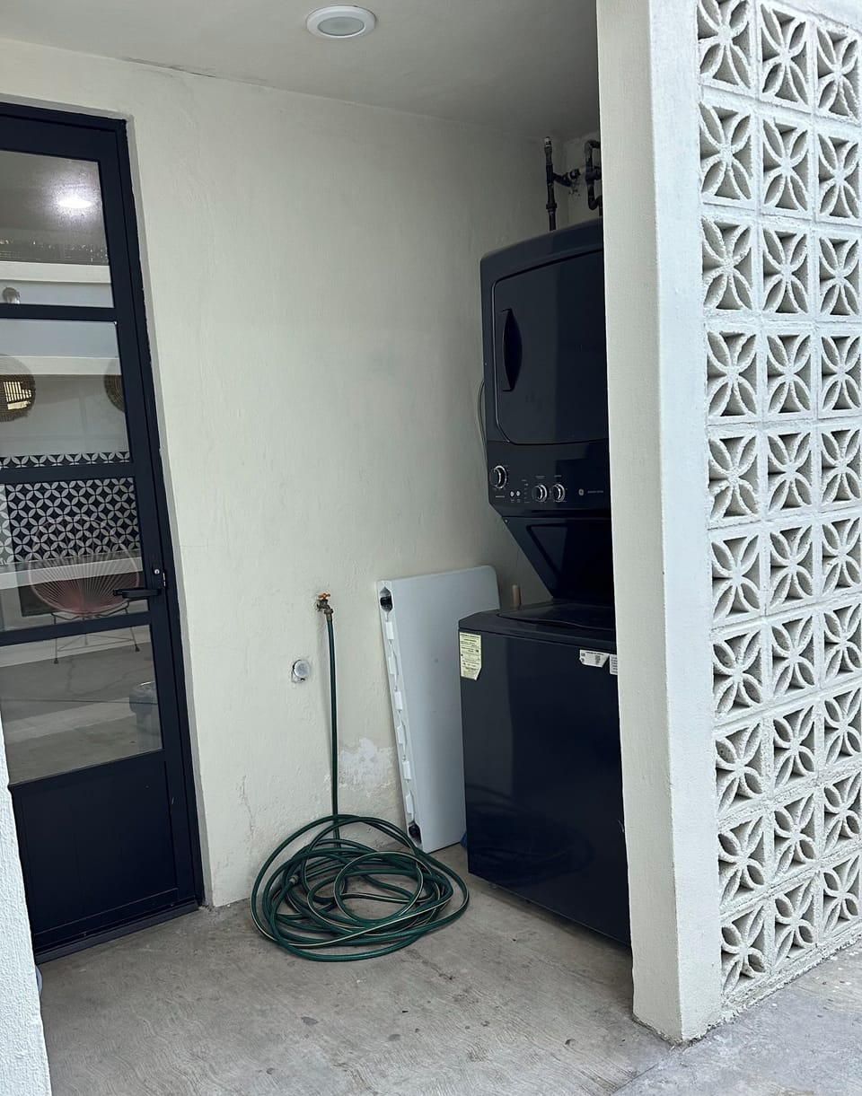 Washer~Dryer in covered area