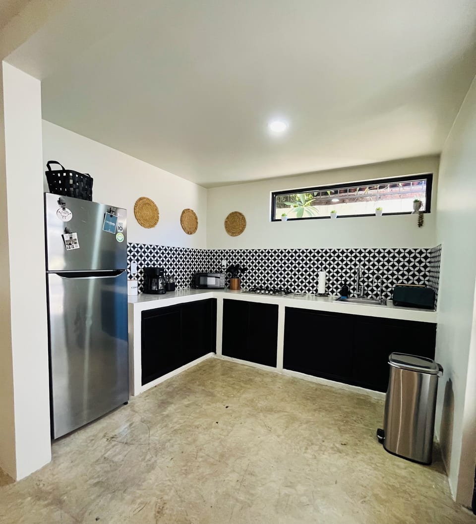 Kitchen with all the amenities needed, water filter, microwave, coffeemaker