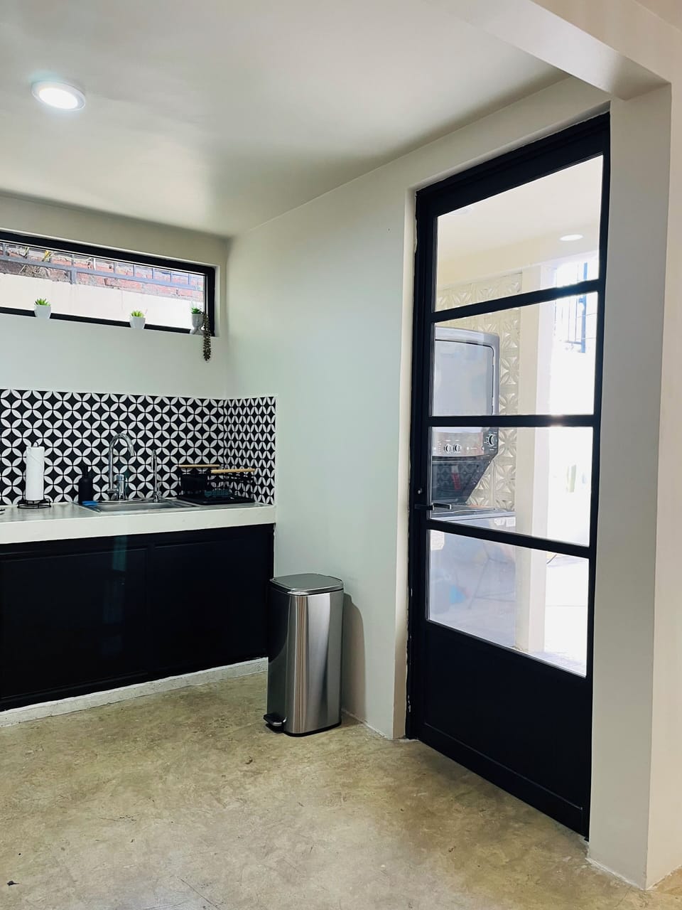 Washer and Dryer right outside kitchen 