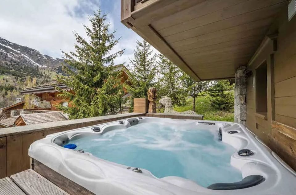 Relax in the PRIVATE Jacuzzi and enjoy the view.