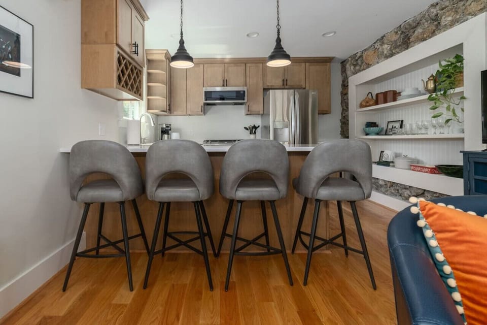 Everything you need is here! A complete kitchen setup with a comfortable 4-seat bar (or specify number) for dining. Save money by cooking at your vacation rental.