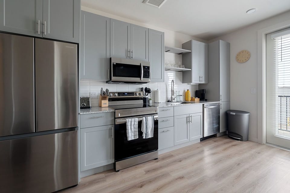 Spacious kitchen with stainless steel appliances