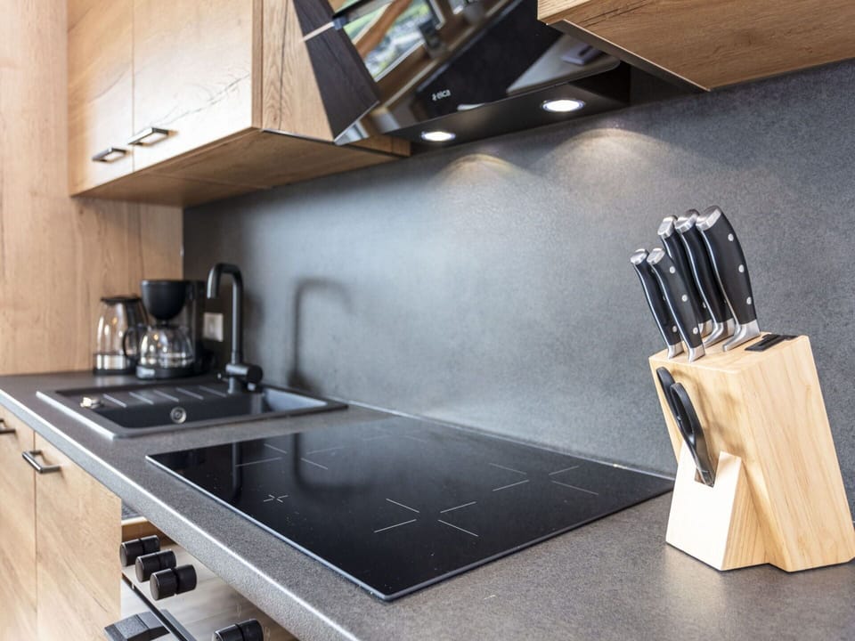 Countertop, Cabinetry, Kitchen Sink, Gas Stove, Kitchen Stove, Cooktop, Wood, Kitchen Appliance, Kitchen, Interior Design