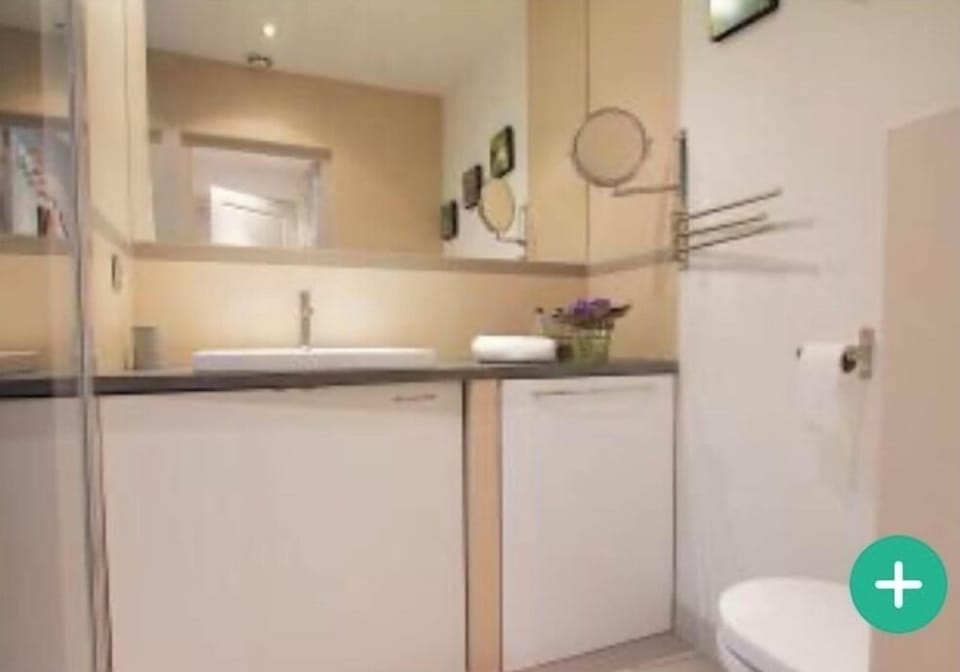 Washing machine is in the bathroom