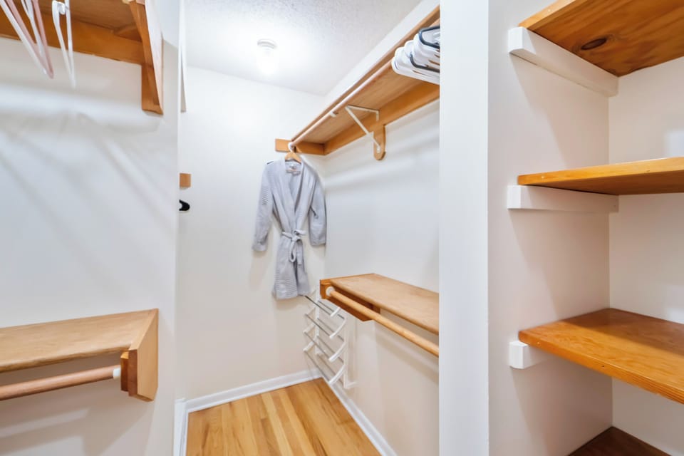 The master bedroom is equipped with a walk-in closet for all your clothes storage needs.