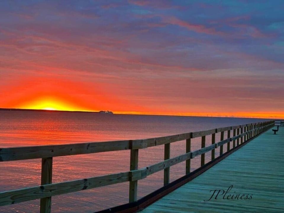 Viking cruise ship enjoying the sunrise at Blair St. Pier, near the house.