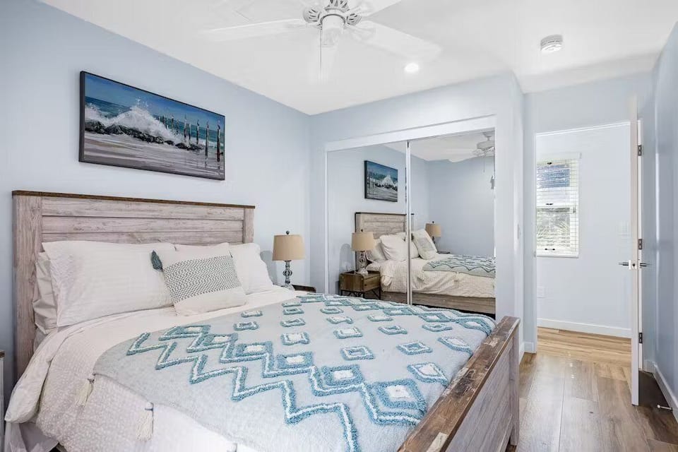 Rest easy in this inviting queen bedroom in Unit 2 cozy, stylish, and made for sweet dreams.