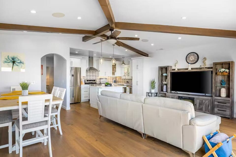 Enjoy effortless entertaining in the open-concept dining and living space, designed for connection and comfort.