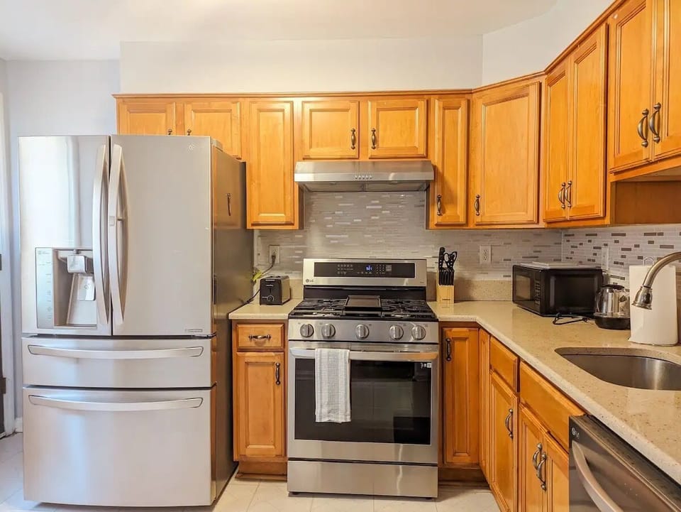 Modern Kitchen Featuring LG Fridge, Stove & Dishwasher