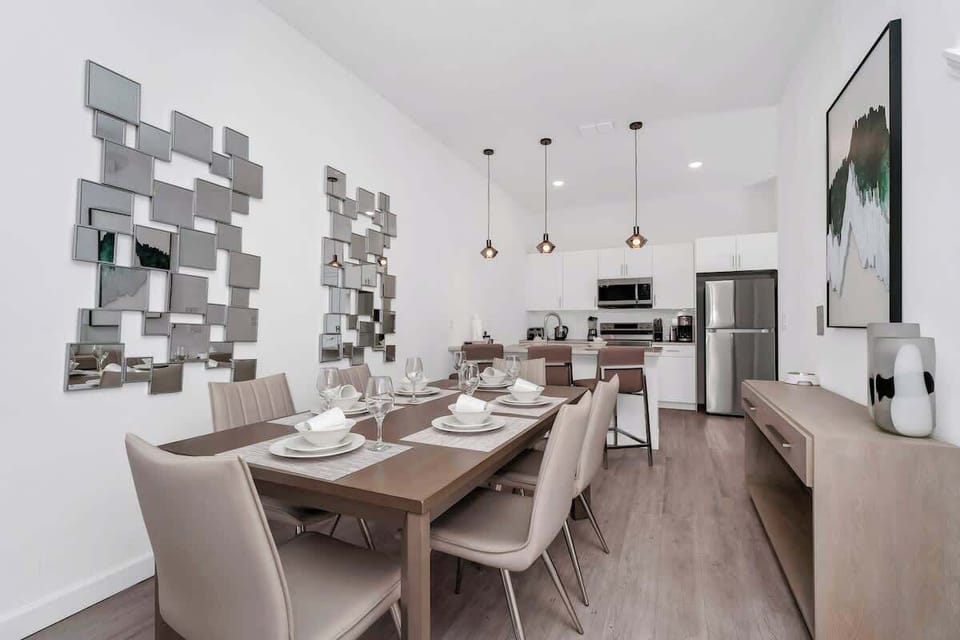 Gather around the spacious dining table, perfect for enjoying meals or game nights with family and friends.