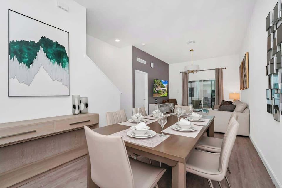 Gather around the spacious dining table, perfect for enjoying meals or game nights with family and friends.