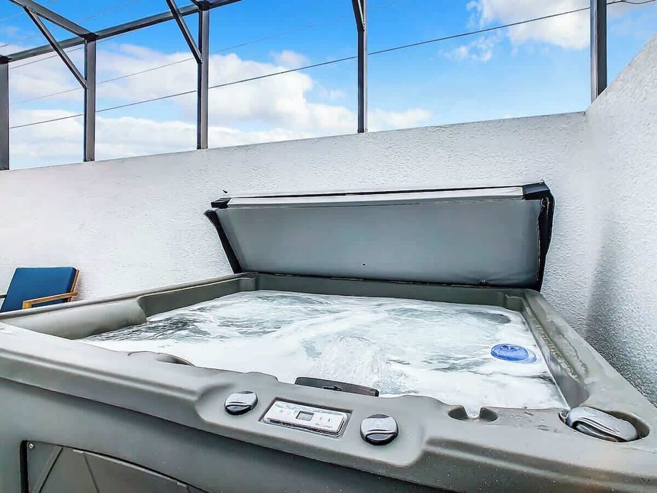 Unwind in the private hot tub, a perfect spot to relax after a long day of exploring.