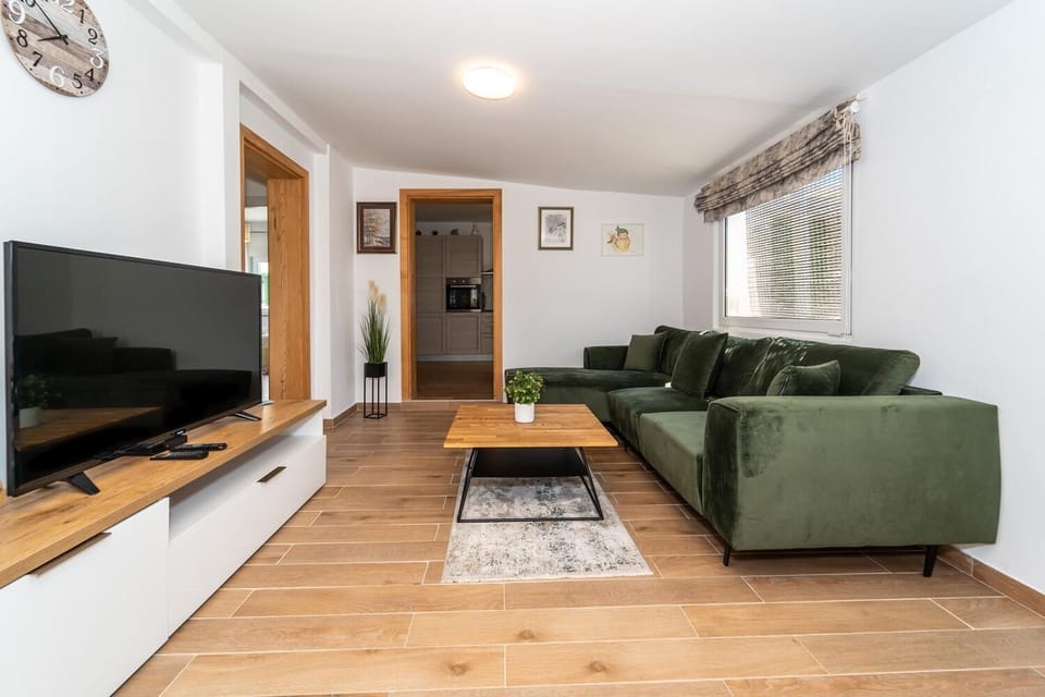 Living room with sofas, WiFi internet, and satellite TV