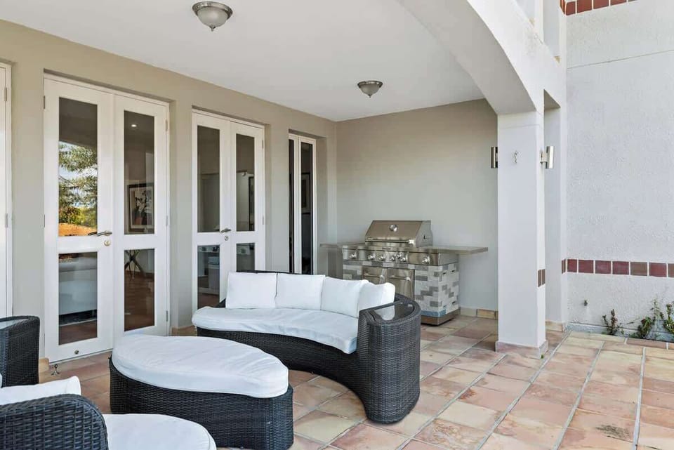 Cushioned seating
Huge, retractable awning for shade and comfort