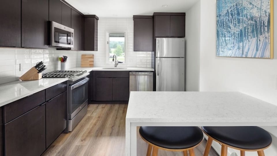 Kitchen with bar seating for 2.