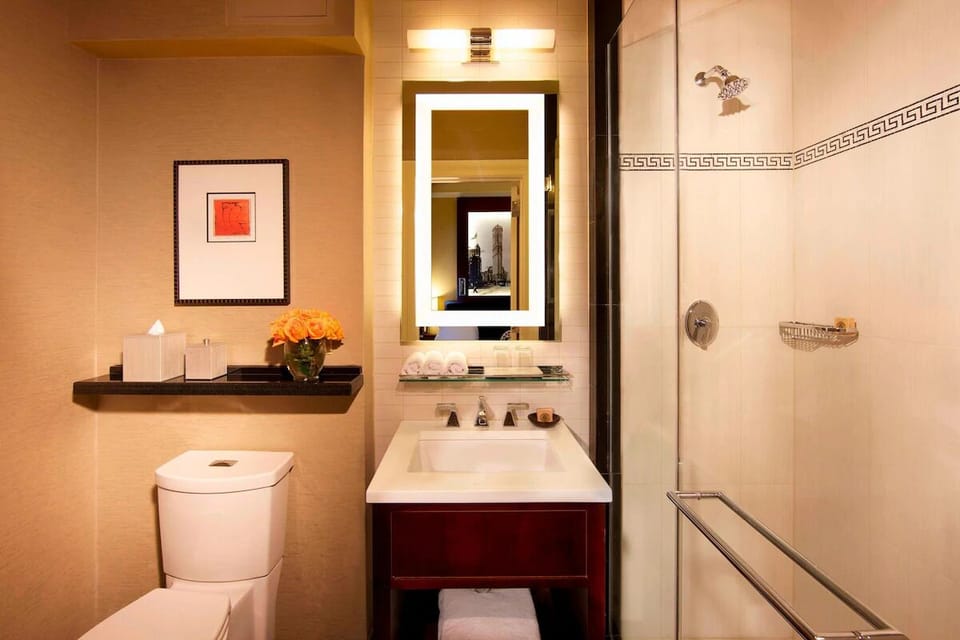Refresh under a sleek shower with spa-like finishes.