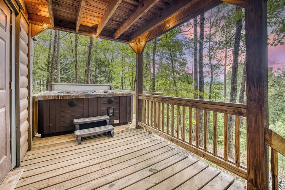 Soak in a 7-person hot tub on a new deck w/ mountain views—pure relaxation!