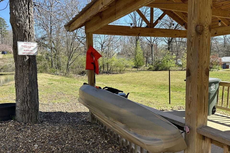Gather around the pond to swing, use the kayak or grab a seat in the covered pavilion