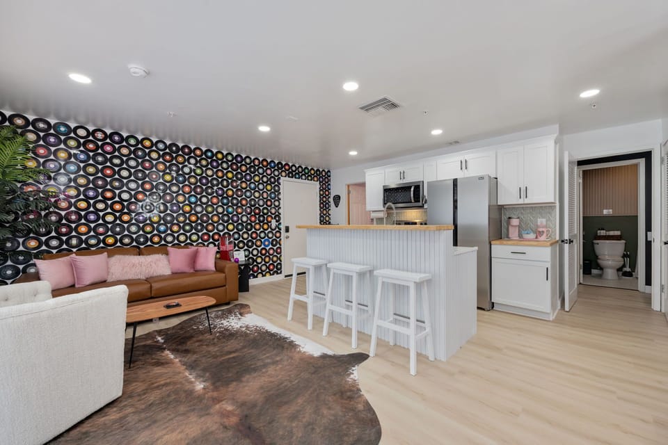 Retro vibes meet modern comfort—unwind in style and enjoy the unique decor!