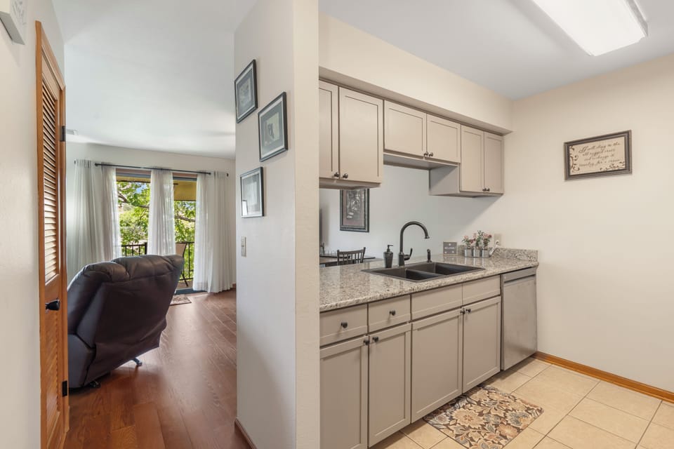 The warm, inviting kitchen offers ample space & every home comfort