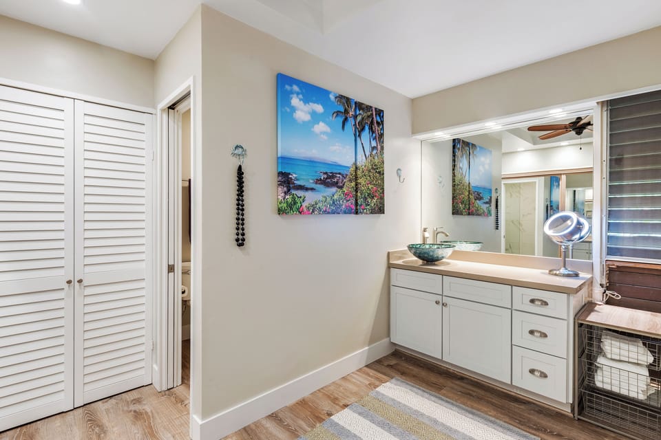 The remodeled bathroom at Maui Kaanapali Villas 292 offers space and style for getting ready.
