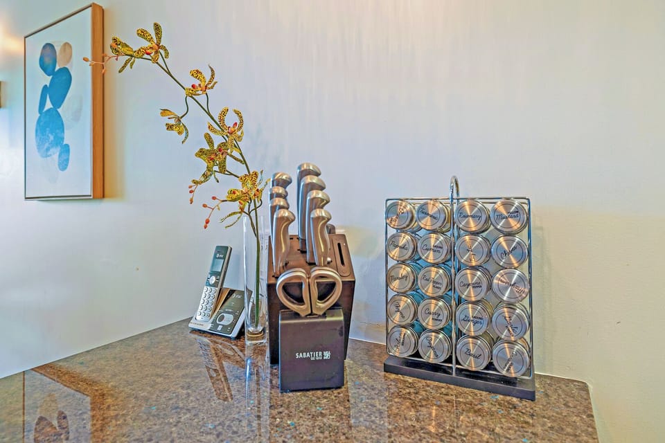 Honua Kai Konea 206’s kitchen includes knife set and spices for easy meal prep.