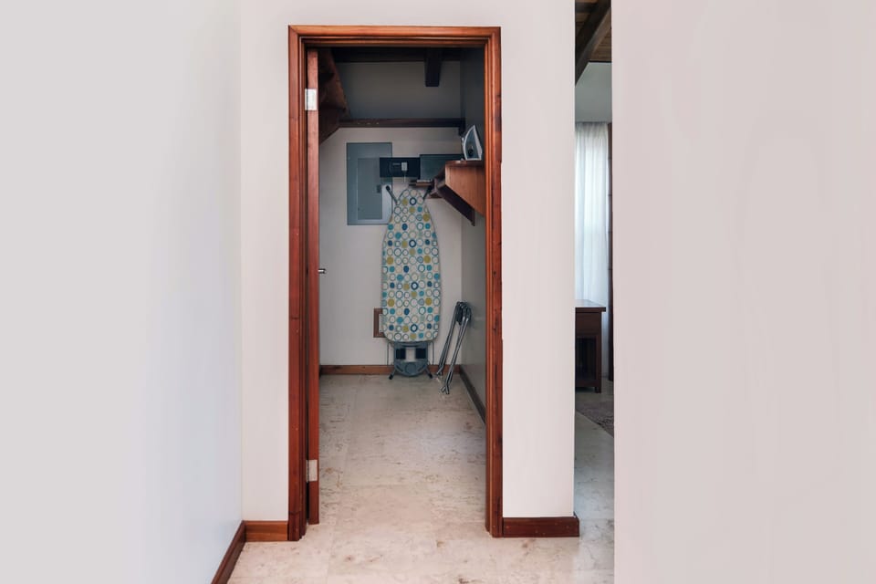 Closet off main hallway with safe