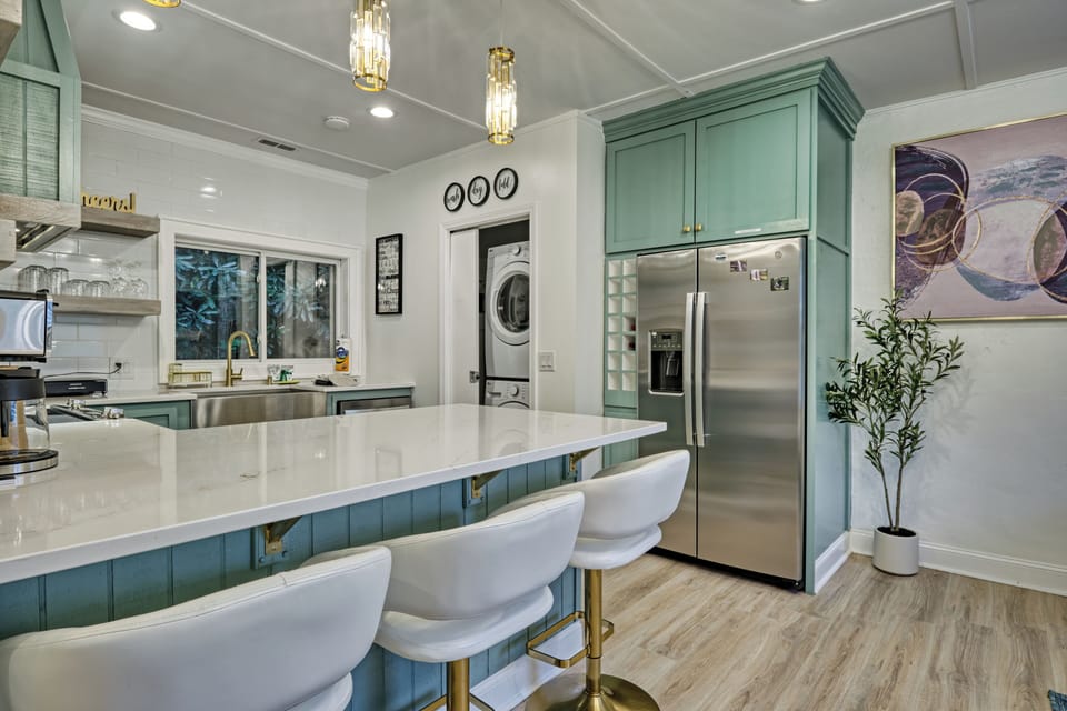 Kitchen with Breakfast Bar & In-house Laundry