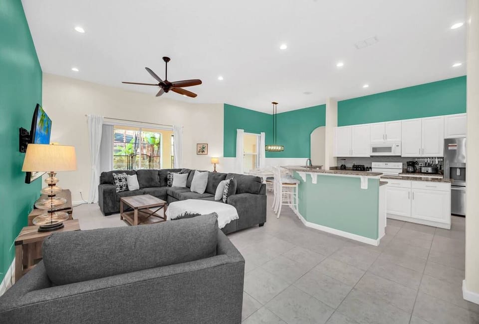 Bright, open-concept living space with a fully equipped kitchen and plenty of room for everyone to gather.