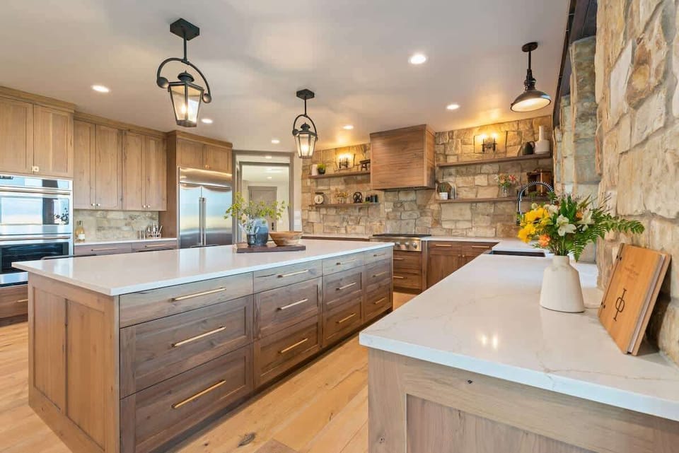 The large quartz counter and open layout is ideal for large meals and gatherings.